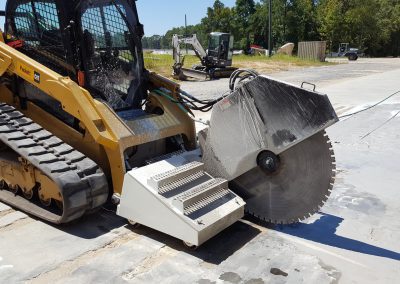 cut through concrete skid steer saw attachments